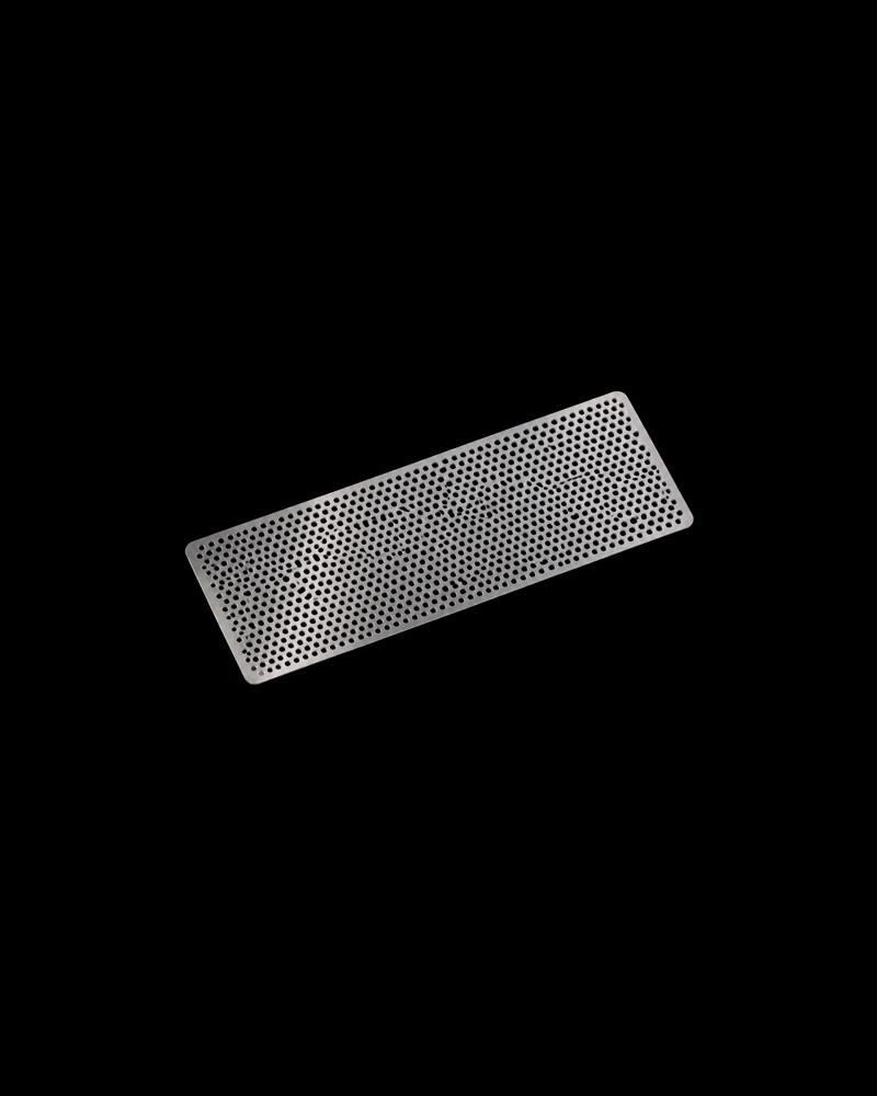 Titanium mesh. A thin sheet. It rebuilds a thin wall, like the floor of the eye socket.